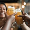 people drinking beer together