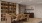 a room with a large table seating and library